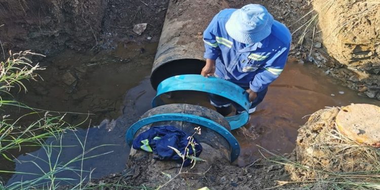 [FILE IMAGE] A municipal worker fixes water infrastructure pipes at Sol Plaatje municipality.