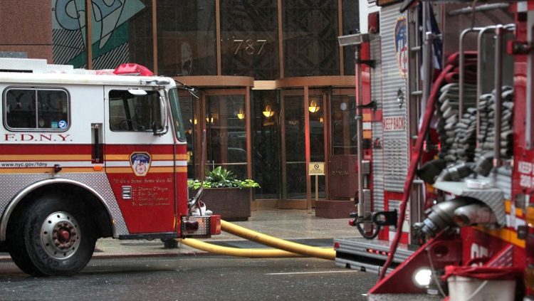 [File Image] Fire Department trucks are seen outside  a building.