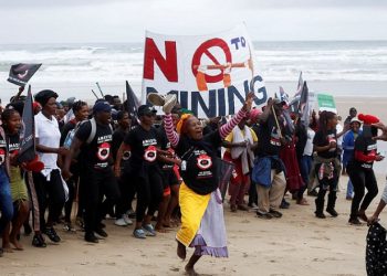 Wild Coast residents demonstrate against Royal Dutch Shell's plans to start seismic surveys to explore petroleum systems off the country's popular Wild Coast at Mzamba Beach, Sigidi, South Africa, December 5, 2021