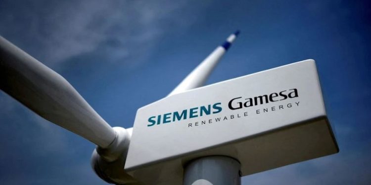 A model of a wind turbine with the Siemens Gamesa logo is displayed outside the annual general shareholders meeting in Zamudio, Spain, June 20, 2017.