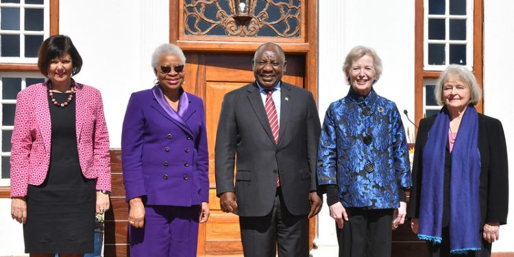 The group known as 'The Elders' pose for a picture with President Cyril Ramaphosa in Pretoria, 26 May 2022