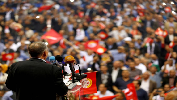 Secretary General of the Tunisian General Labour Union (UGTT) Noureddine Taboubi gives a speech during a rally to mark a Labour Day, in Tunis, Tunisia May 1, 2018.