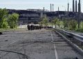 Service members of Ukrainian forces who have surrendered after weeks holed up at Azovstal steel works leave the territory of the plant in Mariupol, Ukraine, in this still image taken from a video released May 18, 2022.