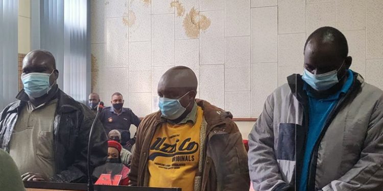 Three suspects in the Hillary Gardee murder case, appearing before the Nelspruit Magistrate's Court, May 10. 2022.