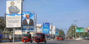 Election banners of Somali presidential candidates are seen along a street in Mogadishu, Somalia. May 12, 2022. REUTERS/Feisal Omar