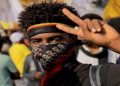 A protester marches during a rally against military rule following coup in Khartoum, Sudan - February 10, 2022.