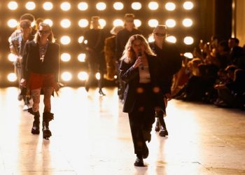 Models present creations by designer Hedi Slimane as part of his Spring/Summer 2023 Menswear collection show for fashion house Celine during Men's Fashion Week in Paris, France June 26, 2022.