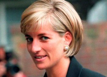 Princess Diana arrives at the Royal Geographical Society in London for a speech on the dangers of landmines throughout the world June 12, 1997.