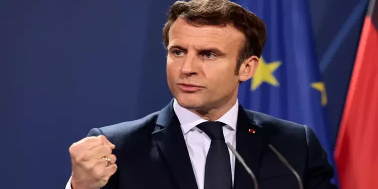 French President Emmanuel Macron speaks to the media ahead of a Weimar Triangle meeting to discuss the ongoing Ukraine crisis, in Berlin, Germany, February 8, 2022.