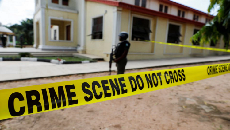 A police crime scene tape is seen in front of St. Francis Catholic Church where gunmen attacked worshippers during a Sunday mass service in Owo, Ondo, Nigeria, June 6, 2022.