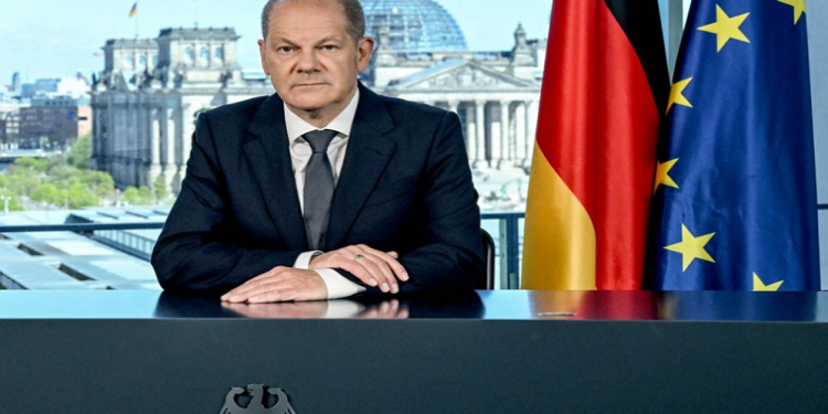 German Chancellor Olaf Scholz addresses the nation in Berlin, Germany, May 8, 2022.