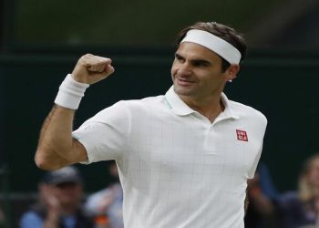 Switzerland's Roger Federer celebrates winning his fourth round match against Italy's Lorenzo Sonego, 5 July 2021.