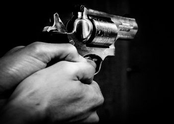 Six cartridges were found at the scene where one man was shot dead and another shot in the stomach at a pub in Kagisanong, in the Free State.
