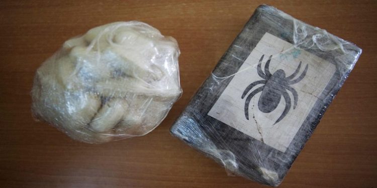 Cocaine is displayed to journalists after being seized by Guinea-Bissau's judicial police in the capital Bissau, March 21, 2012.
