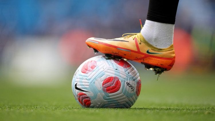 [File Image]: A player has a soccer ball under his boots during a match.