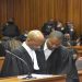 Advocate Malesela Teffo and his attorney Timothy Thobane discuss issues during the Senzo Meyiwa trial at the North Gauteng High Court in Pretoria.