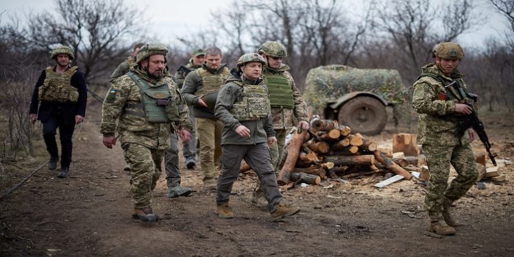 FILE PHOTO: Ukraine's President Volodymyr Zelenskyy visits positions of armed forces near the frontline with Russian-backed separatists during his working trip in Donbass region, Ukraine April 8, 2021. Ukrainian Presidential Press Service/Handout via REUTERS