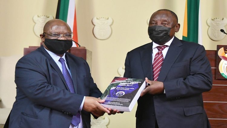 File: President Cyril Ramaphosa receiving the first part of the Judicial Commission of Inquiry into Allegations of State Capture from the Commission’s Chairperson, Acting Chief Justice Raymond Zondo. The Commission’s final report will be submitted to the President in three parts.