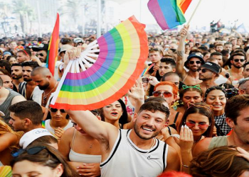 People take part in an annual gay pride parade in Tel Aviv, Israel June 25, 2021.