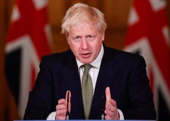 Britain's Prime Minister Boris Johnson gestures during a media conference