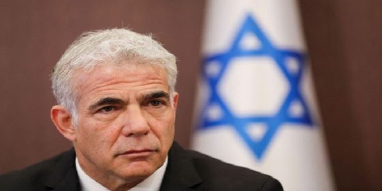 Israeli Foreign Minister Yair Lapid attends a cabinet meeting at the Prime Minister's office in Jerusalem May 15, 2022.