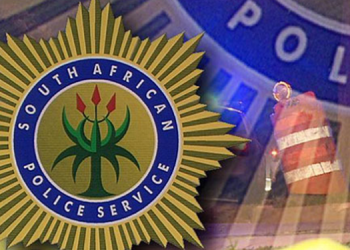 A South African Police Services logo.