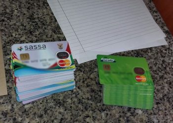File image: Sassa, EasyPay cards and documents on a table.