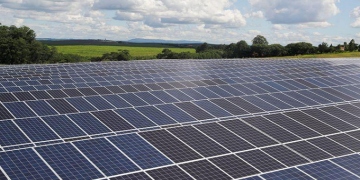 FILE PHOTO: A photovoltaic solar panel farm is seen in Porto Feliz, Sao Paulo state, Brazil February 13, 2020.