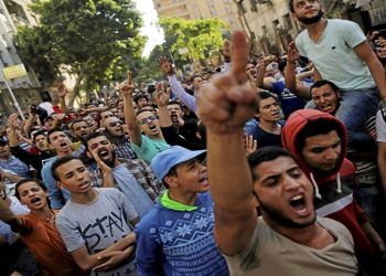 Egyptian protesters and Muslim Brotherhood members shout slogans against President Abdel Fattah al-Sisi