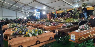 19 empty coffins are displayed at #eNyobeniTavern tragedy mass funeral. The families have decided to bury their children at private ceremonies at various locations around Buffalo City Metro and Mbashe municipality.