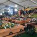 [File Image] 19 empty coffins are displayed at #eNyobeniTavern tragedy mass funeral. The families have decided to bury their children at private ceremonies at various locations around Buffalo City Metro and Mbashe municipality.