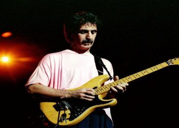 File Image: Rock musician Frank Zappa plays guitar during a performance at the Warner Theatre in Washington, US, February 1988.