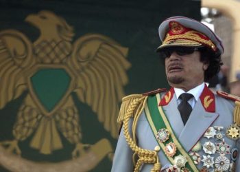 (File Image] Libya's leader Muammar Gaddafi attends a celebration of the 40th anniversary of his coming to power at the Green Square in Tripoli, September 1, 2009.