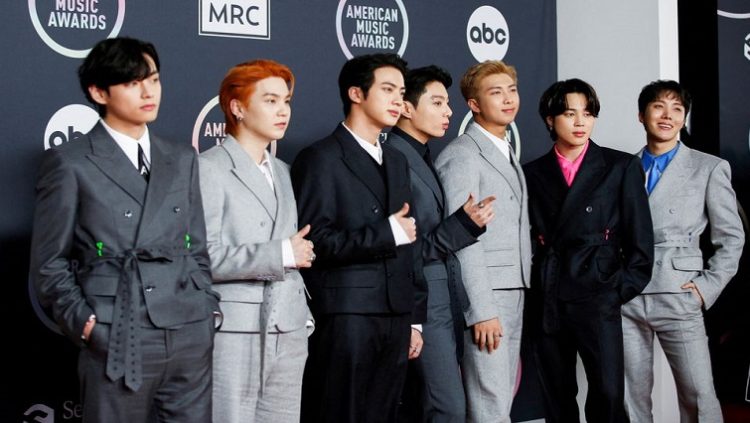 V, Suga, Jin, Jungkook, RM, Jimin and J-Hope of BTS arrive at the 2021 American Music Awards at the Microsoft Theater in Los Angeles.