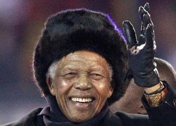 Former South African President Nelson Mandela waves to the crowd at Soccer City stadium during the closing ceremony for the 2010 World Cup in Johannesburg, in this July 11, 2010
