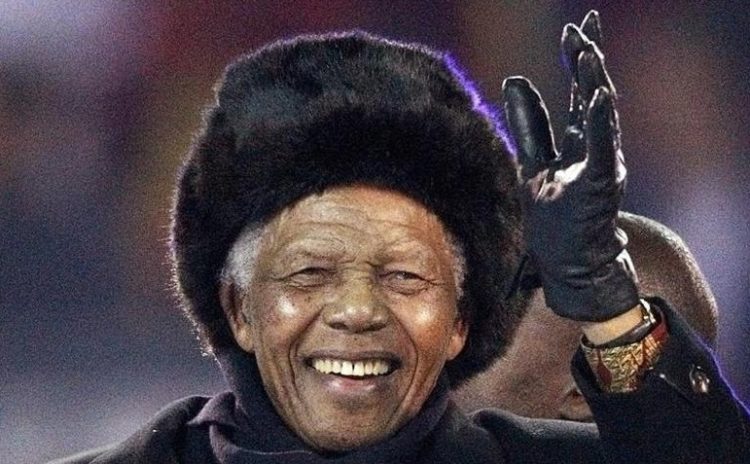 Former South African President Nelson Mandela waves to the crowd at Soccer City stadium during the closing ceremony for the 2010 World Cup in Johannesburg, in this July 11, 2010