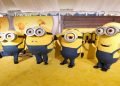 People dressed as the characters Bob, Otto, Stuart and Kevin pose on the red carpet for "Minions: The Rise of Gru" at the TCL Chinese Theatre in Los Angeles, California, U.S., June 25, 2022