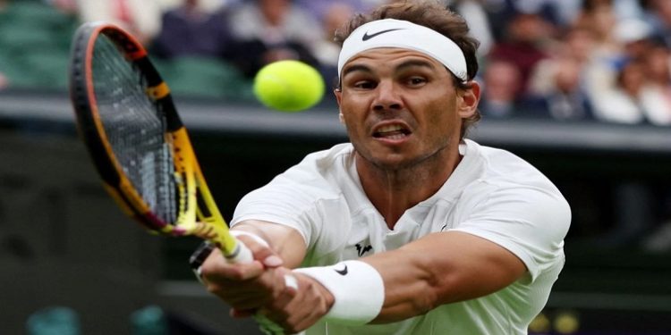 Spain's Rafael Nadal in action during his second-round match against Lithuania's Ricardas Berankis at the All England Lawn Tennis and Croquet Club, London, Britain on 30 June 2022.