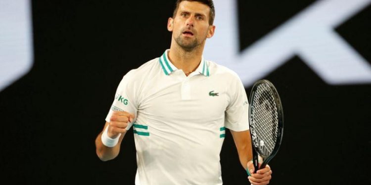 All England Lawn Tennis and Croquet Club, London, Britain - July 8, 2022 Serbia's Novak Djokovic celebrates winning his semi final match.