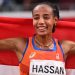 Sifan Hassan of the Netherlands celebrates with her national flag after winning gold