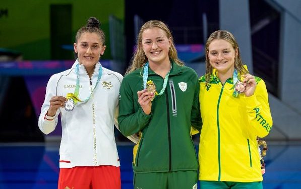 South Africa's Lara van Niekerk (C) on the podium after winning a gold medal.