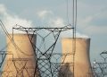 Cooling towers are pictured at a coal-based power station owned by Eskom in Duhva, South Africa, February 18, 2020.