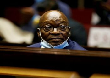 Former President Jacob Zuma sits in the dock during his court appearance.