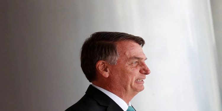 [File Photo]; Brazil's President Jair Bolsonaro gestures after meeting with Hungary's President Katalin Novak (not pictured) at the Planalto Palace in Brasilia, Brazil, July 11, 2022.