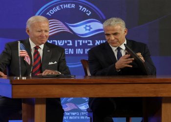 U.S. President Joe Biden and Israeli Prime Minister Yair Lapid attend the first virtual meeting of the "I2U2" group with leaders of India and the United Arab Emirates, in Jerusalem, July 14, 2022.
