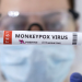 Test tubes labelled "Monkeypox virus positive are seen in this illustration
