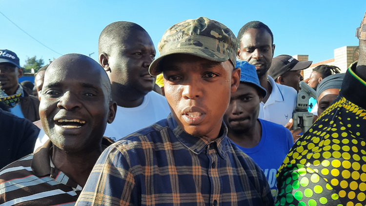 [FILE PHOTO] Nhlanhla "Lux" Mohlauli of Soweto Parliament attends a community protest in Diepsloot, north of Johannesburg.