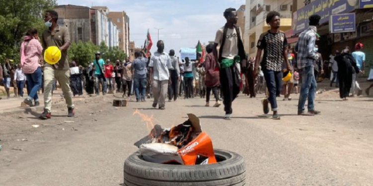 Security forces fired tear gas as protesters marched Khartoum on Sunday against military leadership.