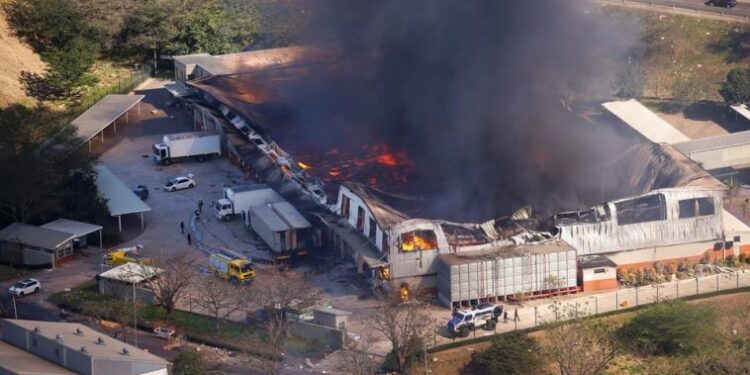 A general view of a burning warehouse during violence and looting in Durban, July 14, 2021.
