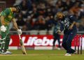 England's Adil Rashid celebrates after bowling out South Africa's Keshav Maharaj.